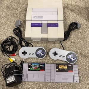 SNES Console with 2 Controllers and 2 games